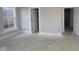 Bright bedroom with window and two open doorways at 4290 Ironclad Dr, Bargersville, IN 46106