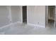 Bright, unfinished bedroom with two open doorways at 4290 Ironclad Dr, Bargersville, IN 46106