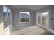 Sun-filled bonus room featuring large windows and sliding glass door at 4290 Ironclad Dr, Bargersville, IN 46106