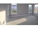 Bright bonus room bathed in natural light from large windows at 4290 Ironclad Dr, Bargersville, IN 46106