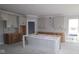 Bright kitchen featuring modern white cabinets and a large island at 4290 Ironclad Dr, Bargersville, IN 46106