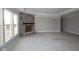 Spacious living room featuring a stone fireplace and plenty of natural light at 4290 Ironclad Dr, Bargersville, IN 46106