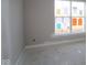 A bright room with a large window, with construction documents posted on the glass at 4290 Ironclad Dr, Bargersville, IN 46106