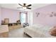 Bedroom with a single bed, bookcase, a cozy chair, and a window with natural light at 4602 Hayward Way, Westfield, IN 46062