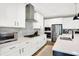 Bright kitchen featuring white cabinets, stainless steel appliances and modern finishes at 4602 Hayward Way, Westfield, IN 46062