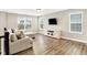 Loft space with modern entertainment center and a comfortable seating area at 4602 Hayward Way, Westfield, IN 46062