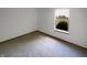 Bedroom features carpet, a window, and ample natural light at 4825 May Ridge Ln, Indianapolis, IN 46254