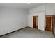 Neutral bedroom with carpet flooring, a closet, and a doorway to another room at 4825 May Ridge Ln, Indianapolis, IN 46254
