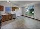 Bright kitchen features matching appliances, wood cabinetry, and natural light at 4825 May Ridge Ln, Indianapolis, IN 46254