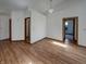 Spacious living room with hardwood floors and natural light, ideal for entertaining at 4825 May Ridge Ln, Indianapolis, IN 46254