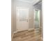 Home entryway featuring hardwood floors and neutral paint at 5196 Canberra Ct, McCordsville, IN 46055