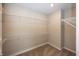 Walk-in closet equipped with wire shelving and neutral carpeting at 5196 Canberra Ct, McCordsville, IN 46055