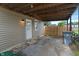 Back patio area with covered parking at 5473 E 18Th St, Indianapolis, IN 46218