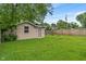 Backyard featuring storage shed with grass at 5473 E 18Th St, Indianapolis, IN 46218