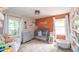 Charming Bedroom features an accent wall, modern decor, and ample natural light at 5601 Rosslyn Ave, Indianapolis, IN 46220