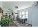 Bright dining room with natural light and views into the spacious kitchen at 5601 Rosslyn Ave, Indianapolis, IN 46220