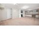 Spacious finished basement featuring carpeting, fireplace with shelves and built-in cabinets at 6020 Gladden Dr, Indianapolis, IN 46220
