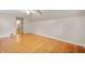 Bright bedroom with hardwood floors, neutral paint and a ceiling fan at 6020 Gladden Dr, Indianapolis, IN 46220