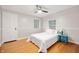Bedroom with hardwood floors, natural light, and ceiling fan at 6020 Gladden Dr, Indianapolis, IN 46220