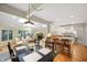 Open-concept living space featuring a kitchen, dining area, and a cozy living room with ample natural light at 6020 Gladden Dr, Indianapolis, IN 46220