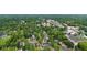 Aerial view showing local residential neighborhood, featuring mature landscaping and beautiful tree canopy at 6045 Dewey Ave, Indianapolis, IN 46219