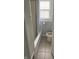Clean bathroom featuring a tiled floor, and shower with a tub at 701 N Gladstone Ave, Indianapolis, IN 46201