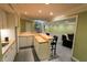 Bright basement with a bar, offering wooden counters and built in storage at 7093 Republic Ln, Indianapolis, IN 46259