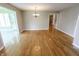 Open dining area showcases hardwood floors and seamless flow into adjacent rooms at 7093 Republic Ln, Indianapolis, IN 46259