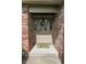 Inviting entryway with a decorative wreath and a charming welcome mat at 7093 Republic Ln, Indianapolis, IN 46259