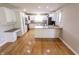 Beautiful kitchen featuring white cabinets, ample counter space, and modern appliances at 7093 Republic Ln, Indianapolis, IN 46259