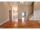 Inviting living area with open layout, hardwood floors, and ample natural light at 7093 Republic Ln, Indianapolis, IN 46259