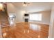 Spacious living room showcasing gleaming hardwood floors and a cozy fireplace at 7093 Republic Ln, Indianapolis, IN 46259