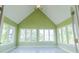 Charming sunroom with vaulted ceilings, ample windows, and a tranquil atmosphere at 7093 Republic Ln, Indianapolis, IN 46259