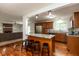 Beautiful kitchen with granite countertops, wood cabinets and stainless steel appliances at 713 Colonial Way, Greenwood, IN 46142