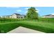 Spacious backyard with a well-maintained lawn and black metal fence at 7226 Sayers Rd, Indianapolis, IN 46259
