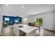 Open concept kitchen with granite countertops, stainless steel appliances and access to the living area at 7226 Sayers Rd, Indianapolis, IN 46259