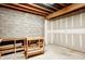 Unfinished basement with concrete floor, exposed ceiling and cinderblock walls, ready for customization at 7333 State Road 42, Martinsville, IN 46151
