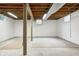 Spacious unfinished basement featuring concrete flooring and painted walls at 7333 State Road 42, Martinsville, IN 46151