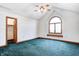 Bright bedroom featuring a large arched window and walk-in closet at 7333 State Road 42, Martinsville, IN 46151