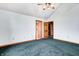 Bedroom featuring two doors and a ceiling fan at 7333 State Road 42, Martinsville, IN 46151