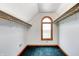 Spacious closet featuring custom shelving, a curved window, and ample storage space at 7333 State Road 42, Martinsville, IN 46151