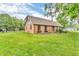 Beautiful exterior showing the house from the side angle and the well-maintained lawn at 7633 Janean Dr, Brownsburg, IN 46112