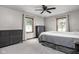 A bright bedroom with two dressers and a neutral decor at 7990 S County Road 200 E, Pittsboro, IN 46167