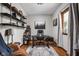 Bright home office features built-in shelving, modern desk and chair, and ample natural light at 7990 S County Road 200 E, Pittsboro, IN 46167