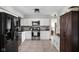 Modern kitchen featuring stainless steel appliances, white cabinetry, and stylish countertops at 7990 S County Road 200 E, Pittsboro, IN 46167