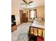 Simple bedroom featuring a twin bed, warm lighting, and neutral carpet at 8123 Summertree Ct, Indianapolis, IN 46256