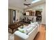 Comfortable living area with wood floors, skylight and open layout to the dining room and kitchen at 8123 Summertree Ct, Indianapolis, IN 46256