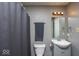Neutral bathroom with a gray vanity, standard toilet, and tub/shower combo at 8446 S Paddleboat Ln, Pendleton, IN 46064