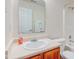 This bathroom has a wood vanity with sink, toilet, and bathtub at 8684 Captain Dr, Avon, IN 46123