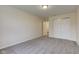 This bedroom has a large closet and a door leading to another room at 8684 Captain Dr, Avon, IN 46123